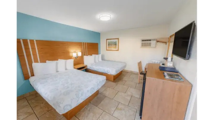 Room with two double beds in the Annex building